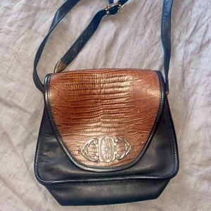 Vintage leather purse with silver accents